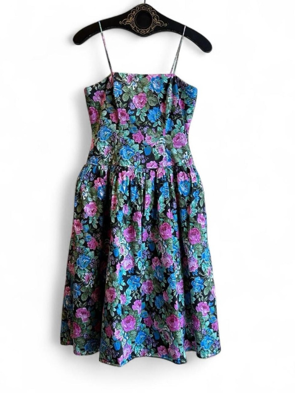 1970s vintage floral print dress with spaghetti straps and zipper down the back